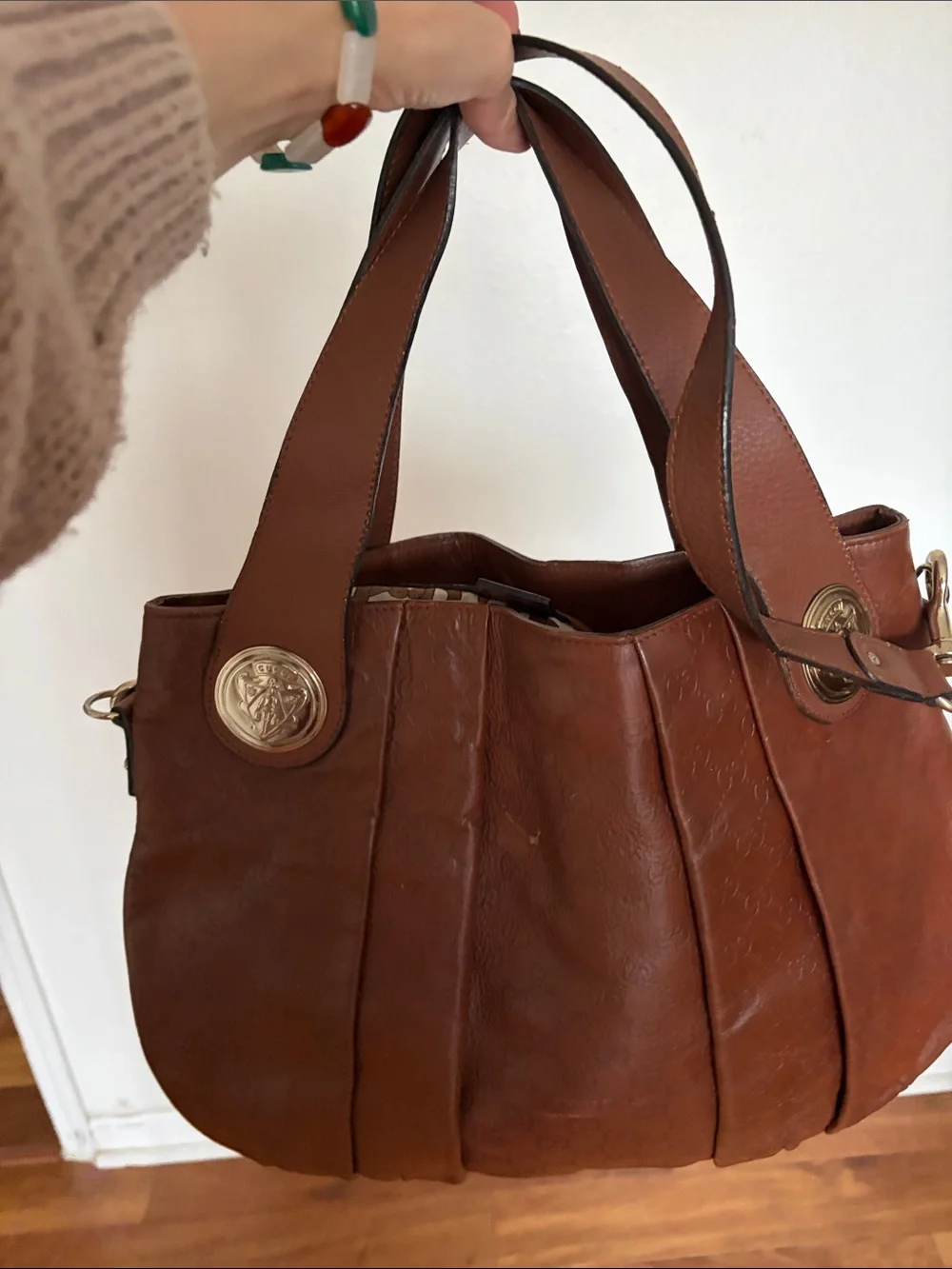 Gucci Cognac Embossed GG Leather Messenger Bag with Gold Medallion
